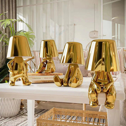Lampe décorative dorée thinker